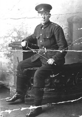 149: Denis Reddy. The emblem on the shoulder says ""Nfld"". Written on the back ""To Mrs.  Reddy from John J. Whelan"" (circa 1918)  ** Note. The person in the photo has also been identified as being John J Whelan.**  - son of James Reddy &amp;amp; Mary Anne Murphy